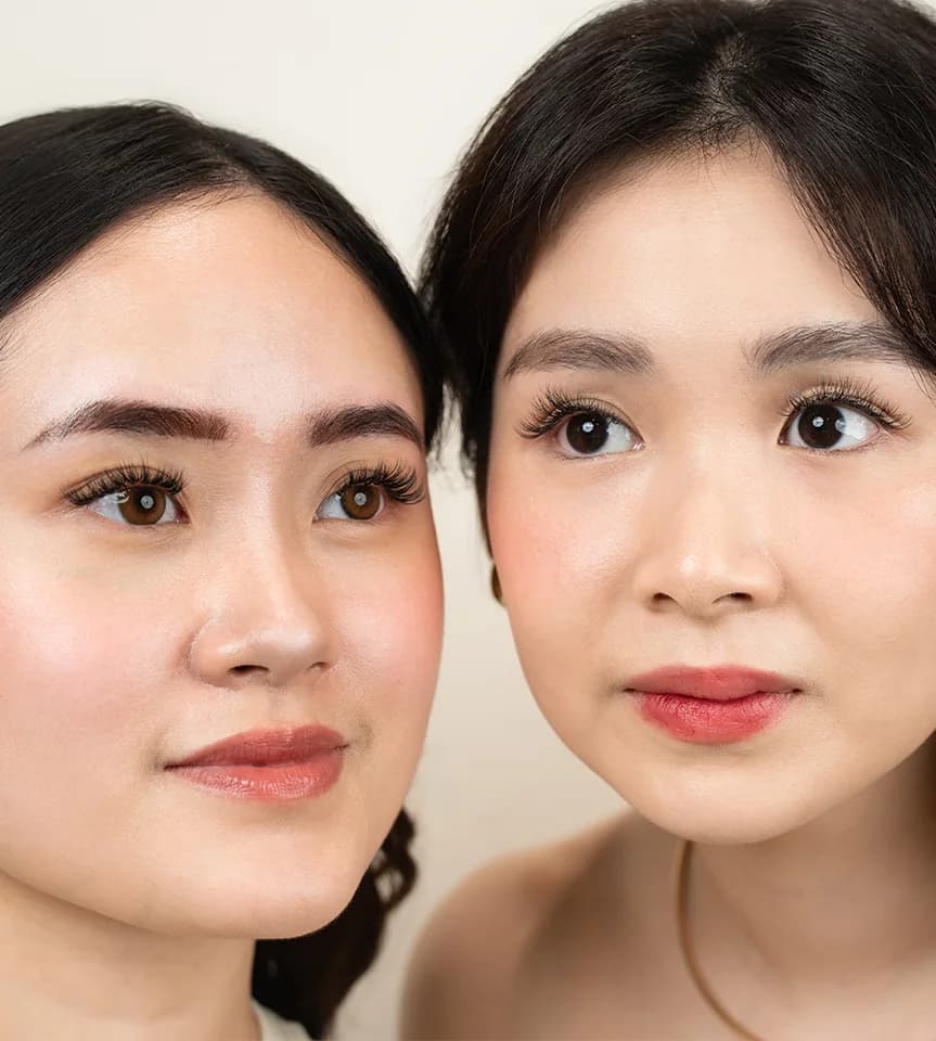 Two POMÉ clients with lash extensions and brow sculpting